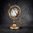 Reloj de globo celestial con flecha