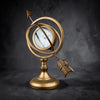 Reloj de globo celestial con flecha