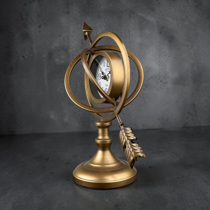 Reloj de globo celestial con flecha