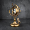Reloj de globo celestial con flecha