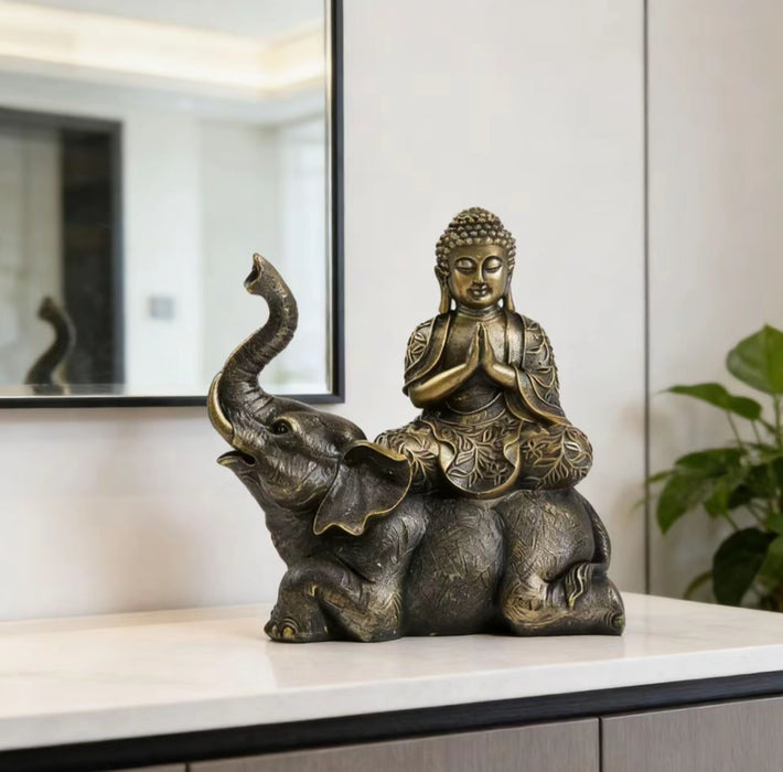 Figurilla Buda sobre elefante dorado