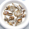 Dije Caracol y conchitas de mar